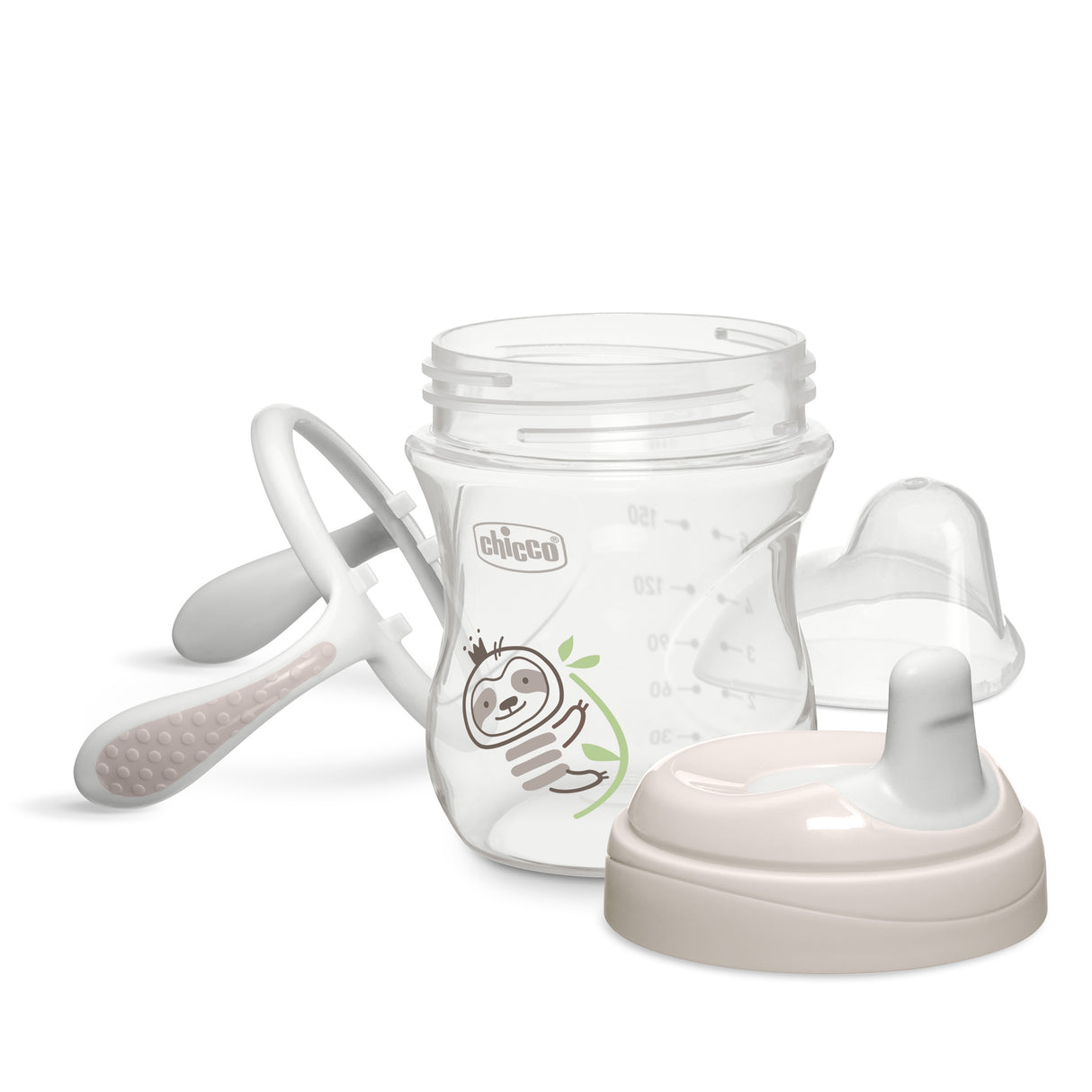 White baby bottle with accessories on a white background