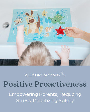 Child playing with toys on a bathtub ledge, with text about Dreambaby's positive proactiveness.
