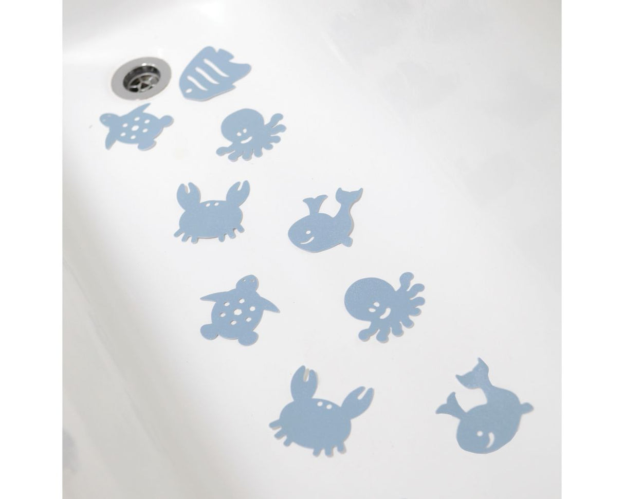 Set of blue sea creature decals on a white bath tub