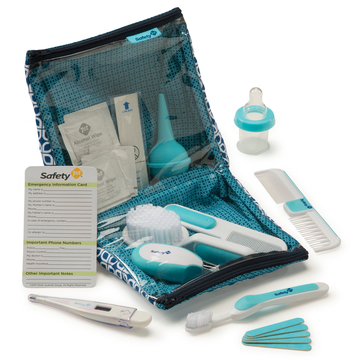 Collection of baby care items including a thermometer, bottle, and various tools in a Safety 1st branded bag on a white background.