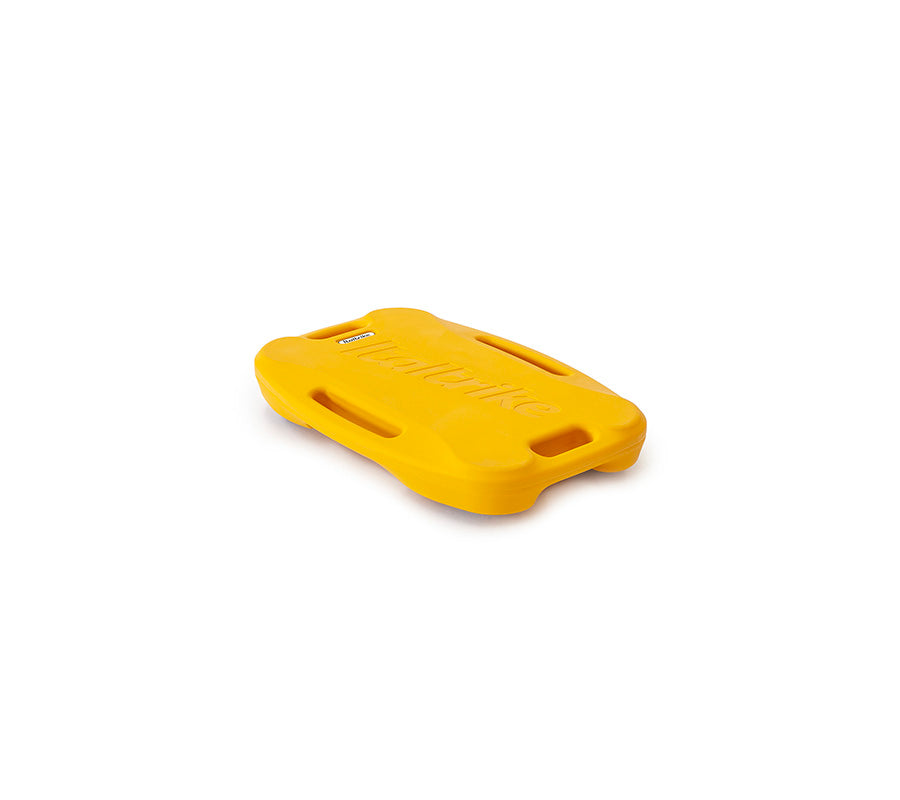 Yellow plastic floatation device on a white background