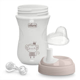 White baby bottle with accessories on a white background, featuring the Chicco brand.