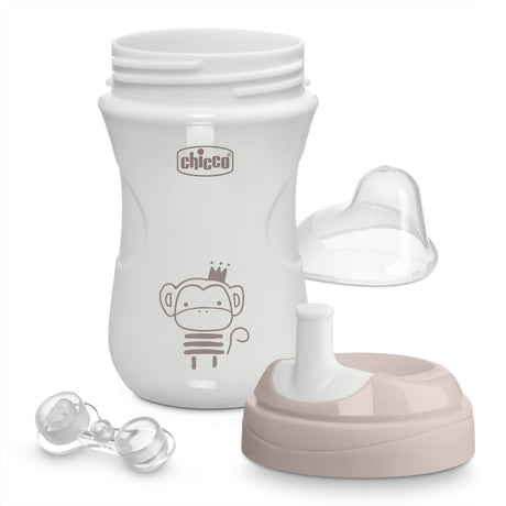 White baby bottle with accessories on a white background, featuring the Chicco brand.