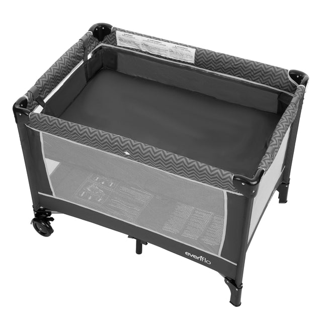 Evenflo portable baby suite play yard with bassinet