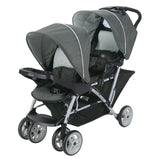 Double stroller with gray canopy and black seats on a white background