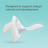 Transparent baby teether with text on a light blue background