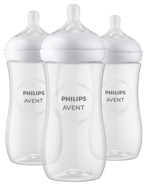 Three Philips Avent baby bottles on a white background