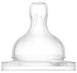 Clear baby bottle nipple on a white background