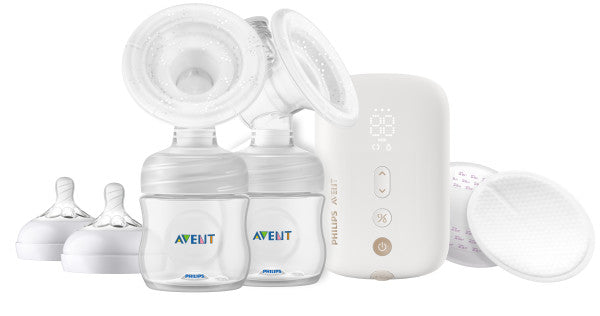 Philips Avent breast pump set with bottles on a white background