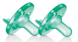 green pacifiers