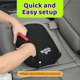 Person inflating a black seat cushion with 'Bubble Gum' branding on a car seat.