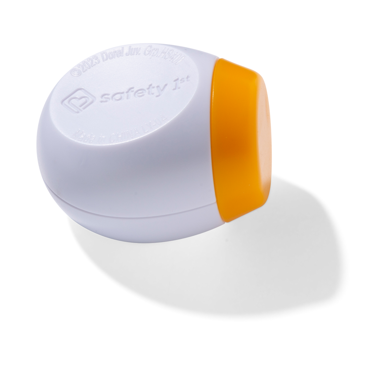 White and orange key with 'Safety 1st' branding on a white background