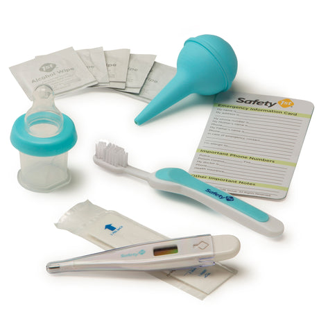 Collection of baby care items including a toothbrush, thermometer, and other tools on a white background.