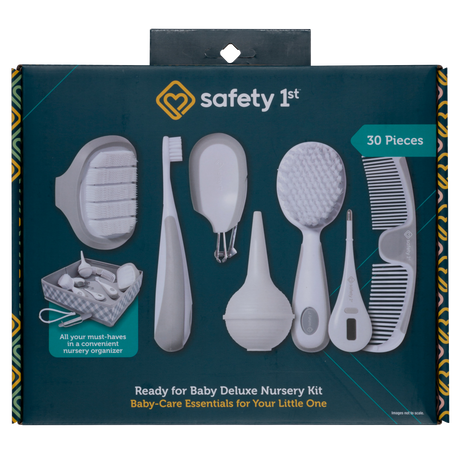 Safety 1st baby care essentials set packaging with tools and comb on a dark blue background