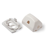 Two white plastic components on a white background