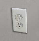 White electrical outlet on a gray wall