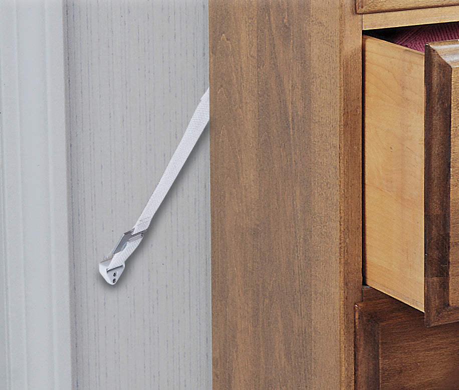 Wooden cabinet with a metal bracket on a gray background with a grey furniture strap