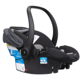 Black baby car seat with safety labels on a white background