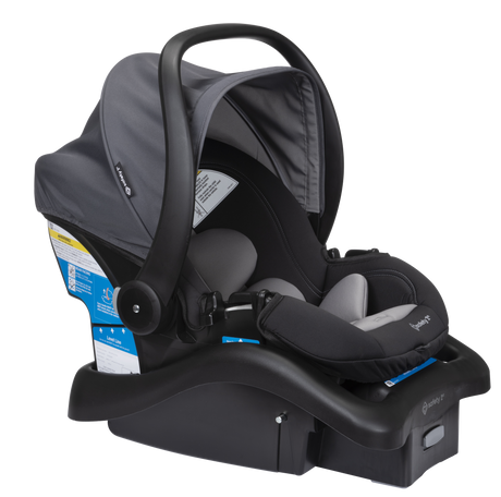 Baby car seat with gray cover and black base on a white background