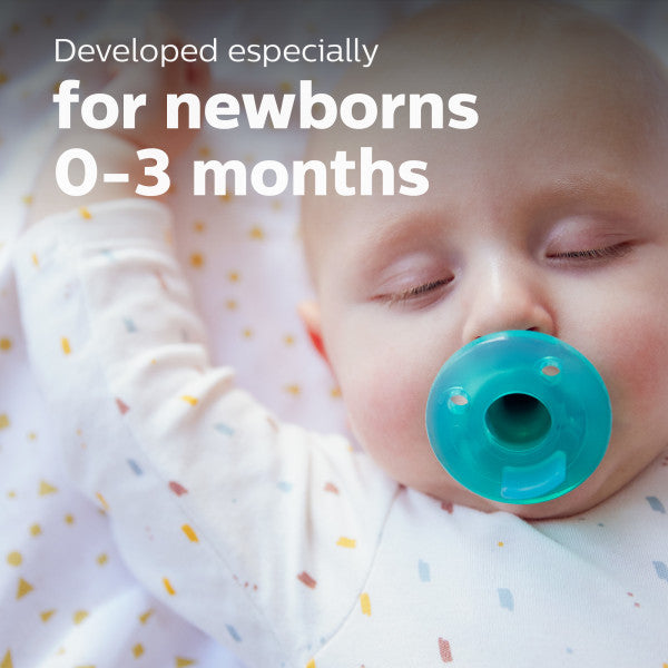 Baby with a green pacifier wearing a colorful outfit, text 'Developed especially for newborns 0-3 months'.