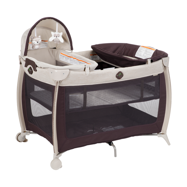 Portable baby crib with wheels on a white background